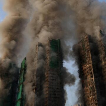 At least four killed as fire rages through bamboo scaffolding at Hong Kong’s high-rise building