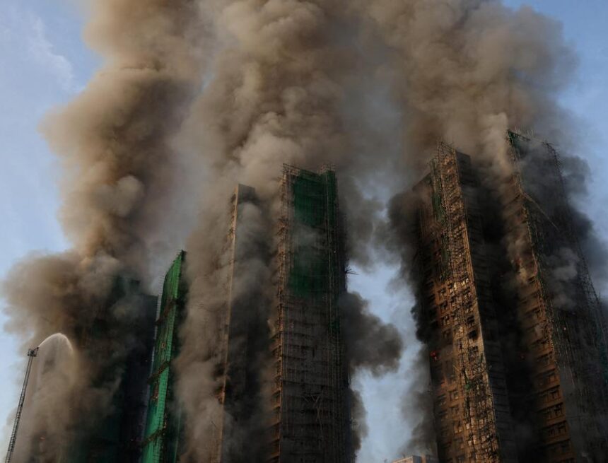 At least four killed as fire rages through bamboo scaffolding at Hong Kong’s high-rise building At least four killed as fire rages through bamboo scaffolding at Hong Kong’s high-rise building