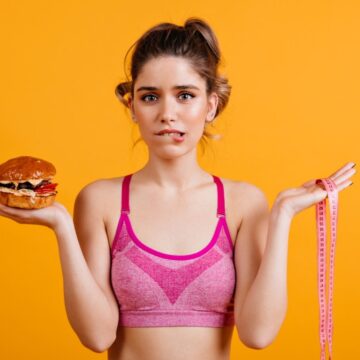 How does one gain muscle while losing fat?