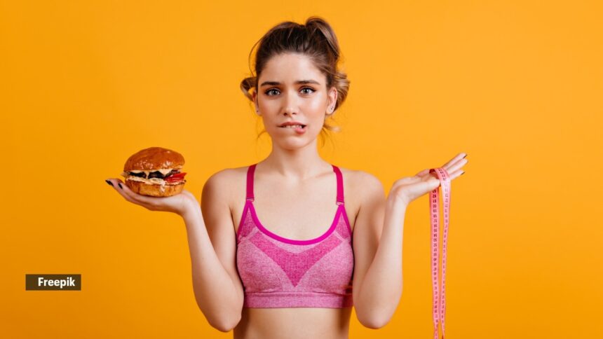 How does one gain muscle while losing fat?